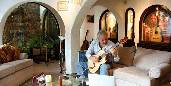 Renato Bellucci, practicing guitar