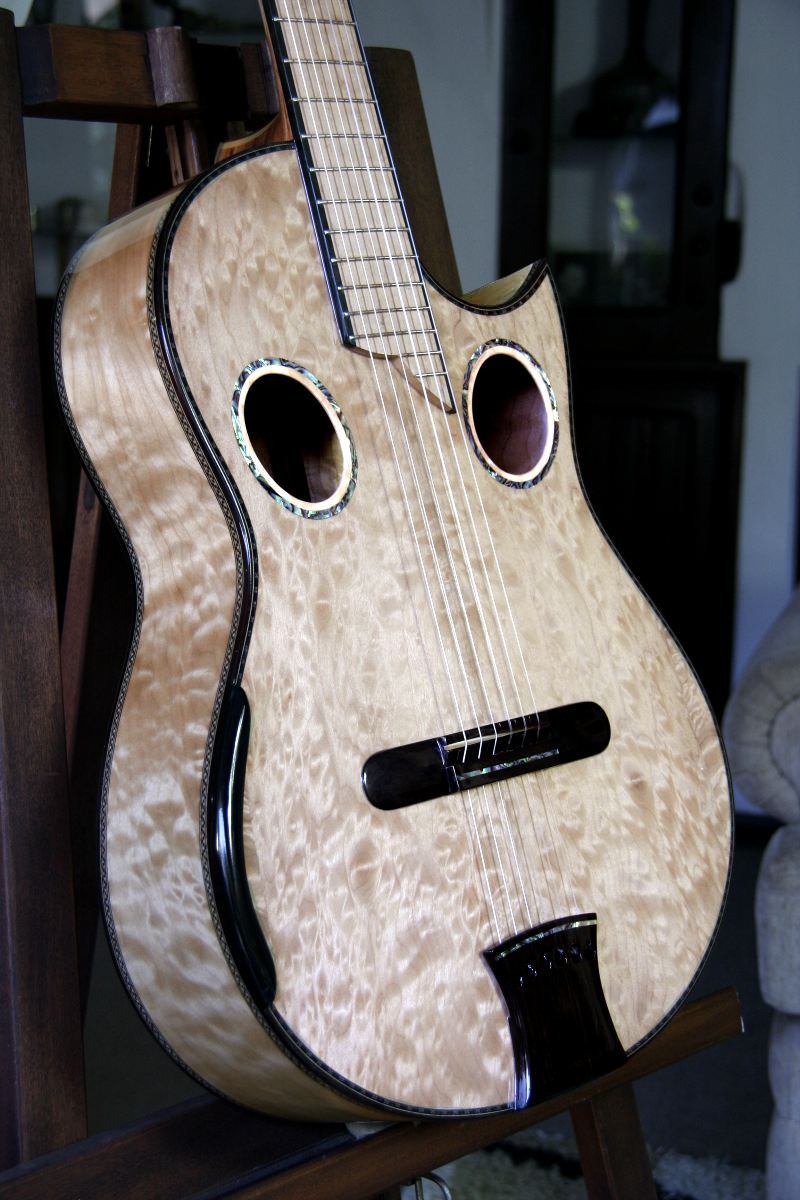 Maple Back and Sides, Special Hauser braced Maple top, 640mm, 16 radiused Ebony fingerboard